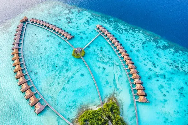Turquoise lagoon and overwater villas in the Maldives
